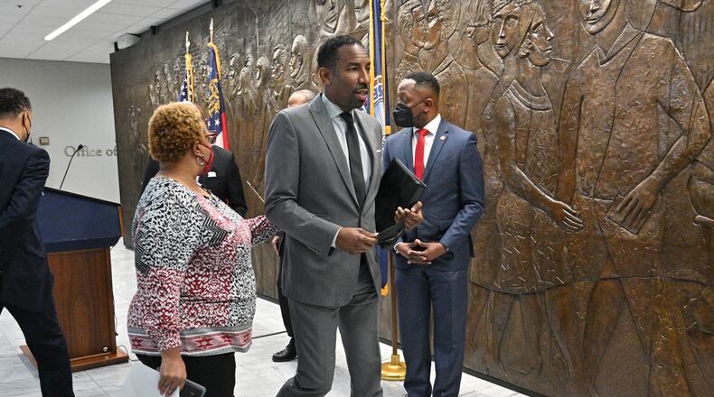 Mayor Andre Dickens leaves a press conference at Atlanta City Hall on Thursday, February 3, 2022. Dickens announced an agreement had been reached with the Integral Group. (Hyosub Shin / Hyosub.Shin@ajc.com)