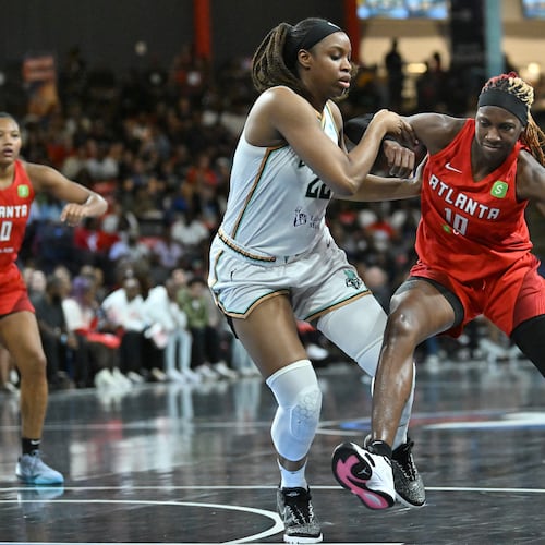 Atlanta Dream guard Rhyne Howard (10), who had 19 points in Wednesday's win over the Los Angeles Sparks, drives against New York Liberty forward Kennedy Burke (22) during the first half in a WNBA basketball game at Gateway Center Arena, Saturday, August 23, 2025, in Atlanta. (Hyosub Shin/AJC)