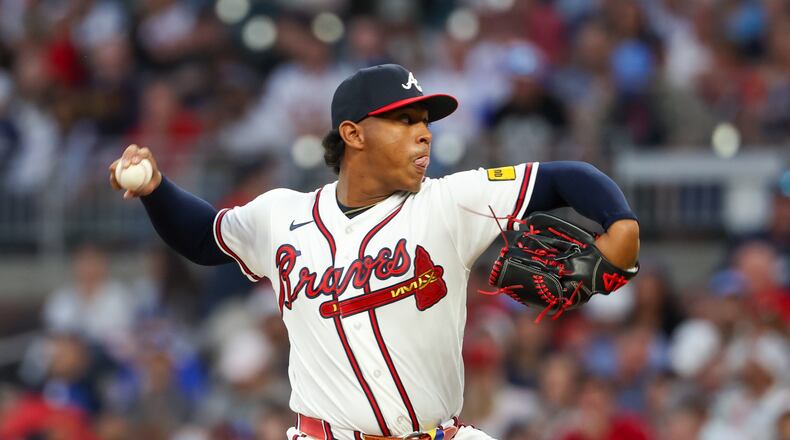 Braves pitcher Didier Fuentes, shown here throwing against the Cubs last month, has mostly stayed true to his routine that got him to the big leagues as a starter. (Arvin Temkar/AJC)
