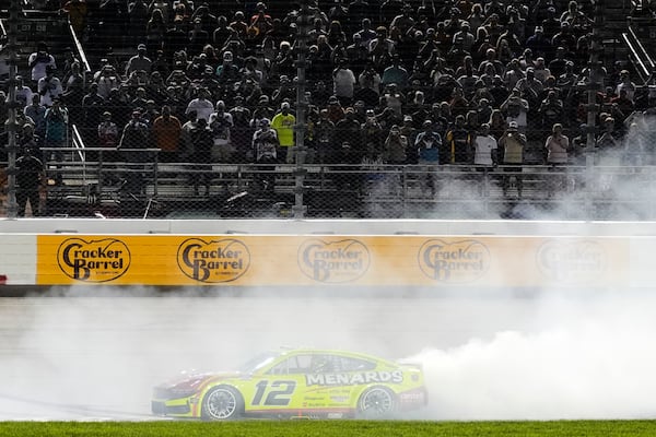 Ryan Blaney does a burnout after winning a NASCAR Cup Series auto race Sunday, June 1, 2025, in Lebanon, Tenn. (AP Photo/George Walker IV)