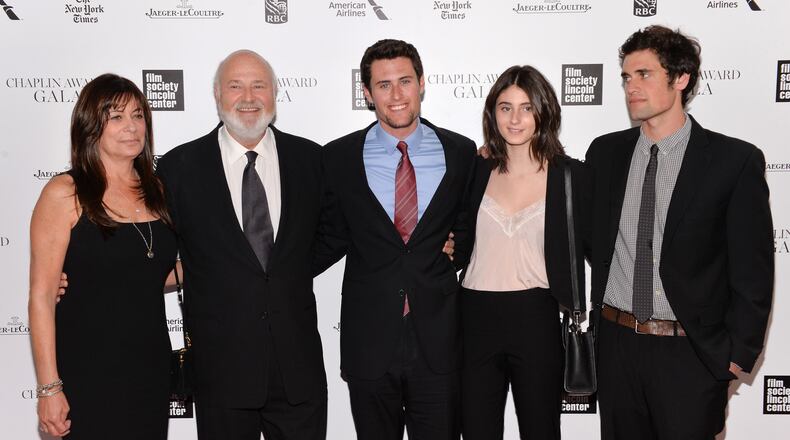 FILE - Honoree Rob Reiner, second left, poses with his wife Michele, left, and children Jake, center, Romy, and Nick at the 41st annual Chaplin Award Gala at Avery Fisher Hall, April 28, 2014, in New York. (Photo by Evan Agostini/Invision/AP, File)