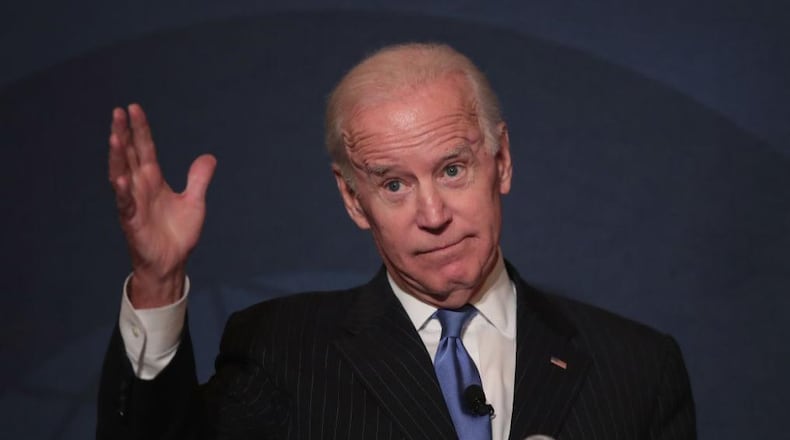 Former Vice President Joe Biden spoke with a homeless man outside a Washington thaater.