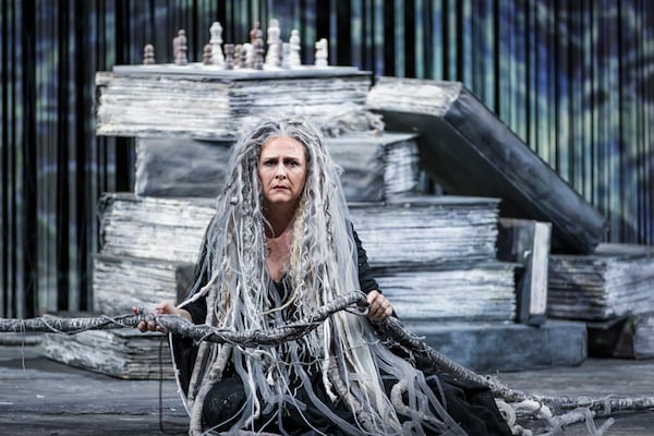Caitlin Lynch shines as Third Norn in the Atlanta Opera’s "Twilight of the Gods." The  production by director Tomer Zvulun and scenic and projection designer Erhard Rom frames the action inside a brutal, violent society suggestive of modern fascism. (Raftermen/Courtesy of Atlanta Opera)