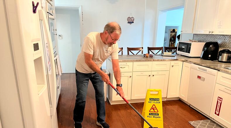 Bernie Murphy's volunteer time at the Atlanta Hospital Hospitality House includes greeting guests, cooking dinner and handling household chores. Courtesy