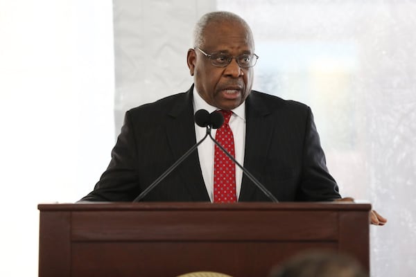 Justice Clarence Thomas delivers the keynote speech on Tuesday, Feb. 11, 2020, during the dedication ceremony for the new Nathan Deal Judicial Center in Atlanta. (credit: Miguel Martinez for The Atlanta Journal-Constitution)