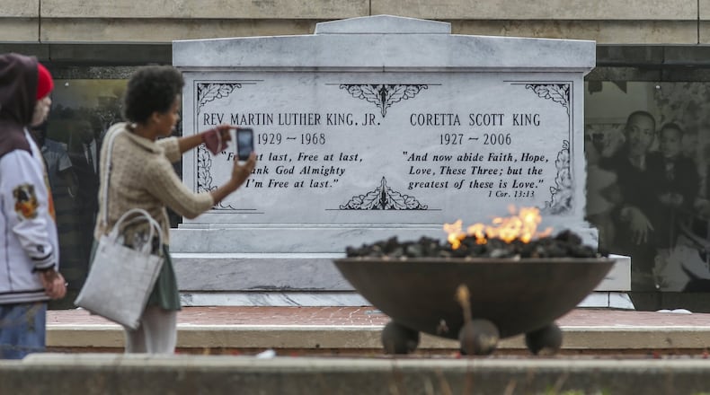 January 2017: Visitors to the crypt of Dr. and Mrs. King at the King Center at 449 Auburn Ave. NE in Atlanta. JOHN SPINK /JSPINK@AJC.COM