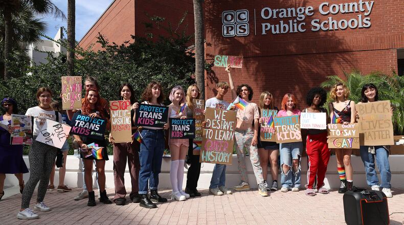 Students held a rally outside an Orange County School Board meeting on May 24, 2022, as a student group based at Winter Park High and a local group opposed to book bans gathered to rally against Florida laws, including the so-called "Don't Say Gay" law. (Ricardo Ramirez Buxeda/Orlando Sentinel/TNS)