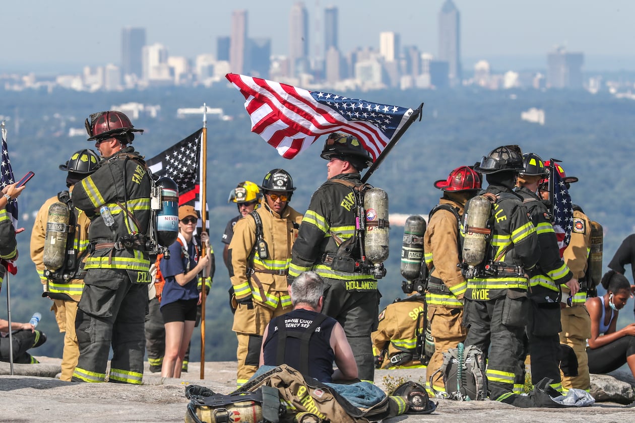 Wearing a full turnout firefighting gear, some 200 metro Atlanta area firefighters honored the 343 firefighters and paramedics, and 72 law enforcement officers who lost their lives on Sept. 11, 2001 by ascending Stone Mountain on Friday, September 10, 2021. The City of Fayetteville Fire Department who sponsors the annual event for the one-mile climb that is equivalent to 160 flights of stairs has seen the event grow every year that also includes police and military participants. Numerous events are scheduled Saturday around the metro area to observe the 20th anniversary of the terror attacks on Sept. 11, 2001. (John Spink / John.Spink@ajc.com)