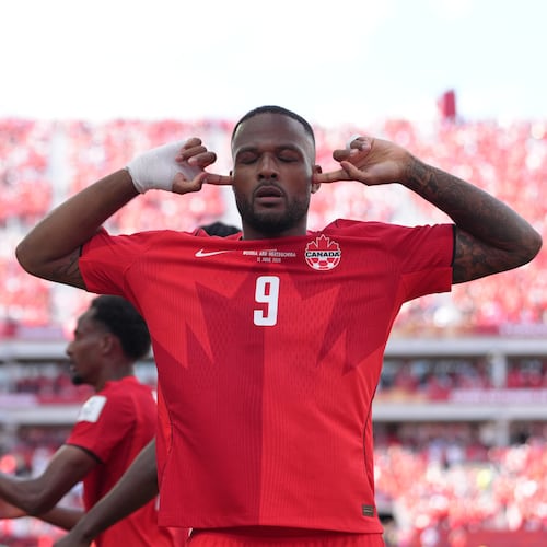 Canada's Cyle Larin (9) celebrates after scoring his sides first goal of the game in the second half of the World Cup Group B soccer match between Canada and Bosnia, Friday, June 12, 2026, in Toronto. ( (AP Photo/Sam Balkansky)
