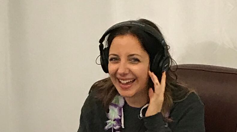 Davi Crimmins, social media director for the Bert Show, gets to go on Bert's Big Adventure in Disney for the first time. CREDIT: Rodney Ho/rho@ajc.com