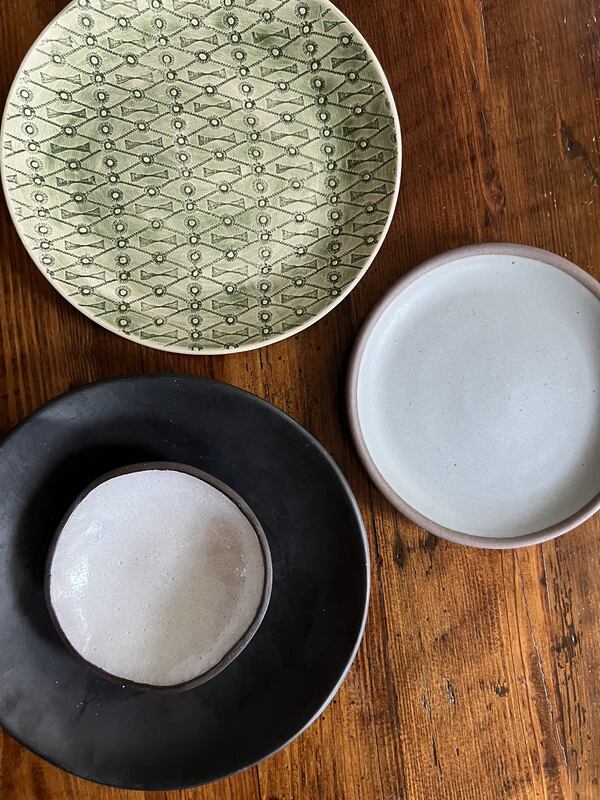 Kesler Imerman gravitates toward ceramic and pottery-style plates and serveware in her collection. 