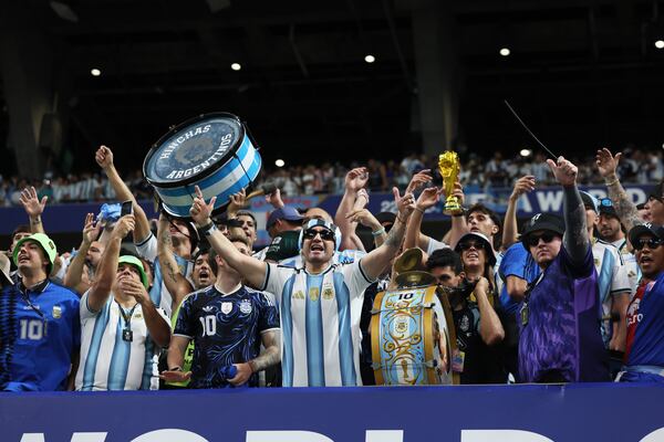 Argentina fans cheer as their team appears on the pitch before the start of Argentina vs. England FIFA World Cup Semifinal match at Atlanta Stadium (Mercedes-Benz Stadium) on Wednesday, July 15, 2026.  (Jason Getz/AJC)