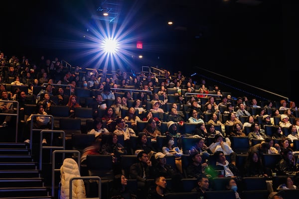This photo provided by Chang Liu shows audience members at a screening of the movie Ne Zha 2 in New York, on March 1.(Chang Liu via AP)