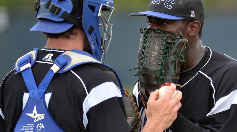 May 18, 2013 McDonough - Mt. Paran catcher Will Schnure (left) and Mt. Paran pitcher Kyle Trammell (26) confer during game one of a double header at Eagle's Landing Christian Academy in McDonough on Saturday, May 18, 2013. Eagle's Landing won the game one of a double header 5-1 over Mt. Paran. HYOSUB SHIN / HSHIN@AJC.COM