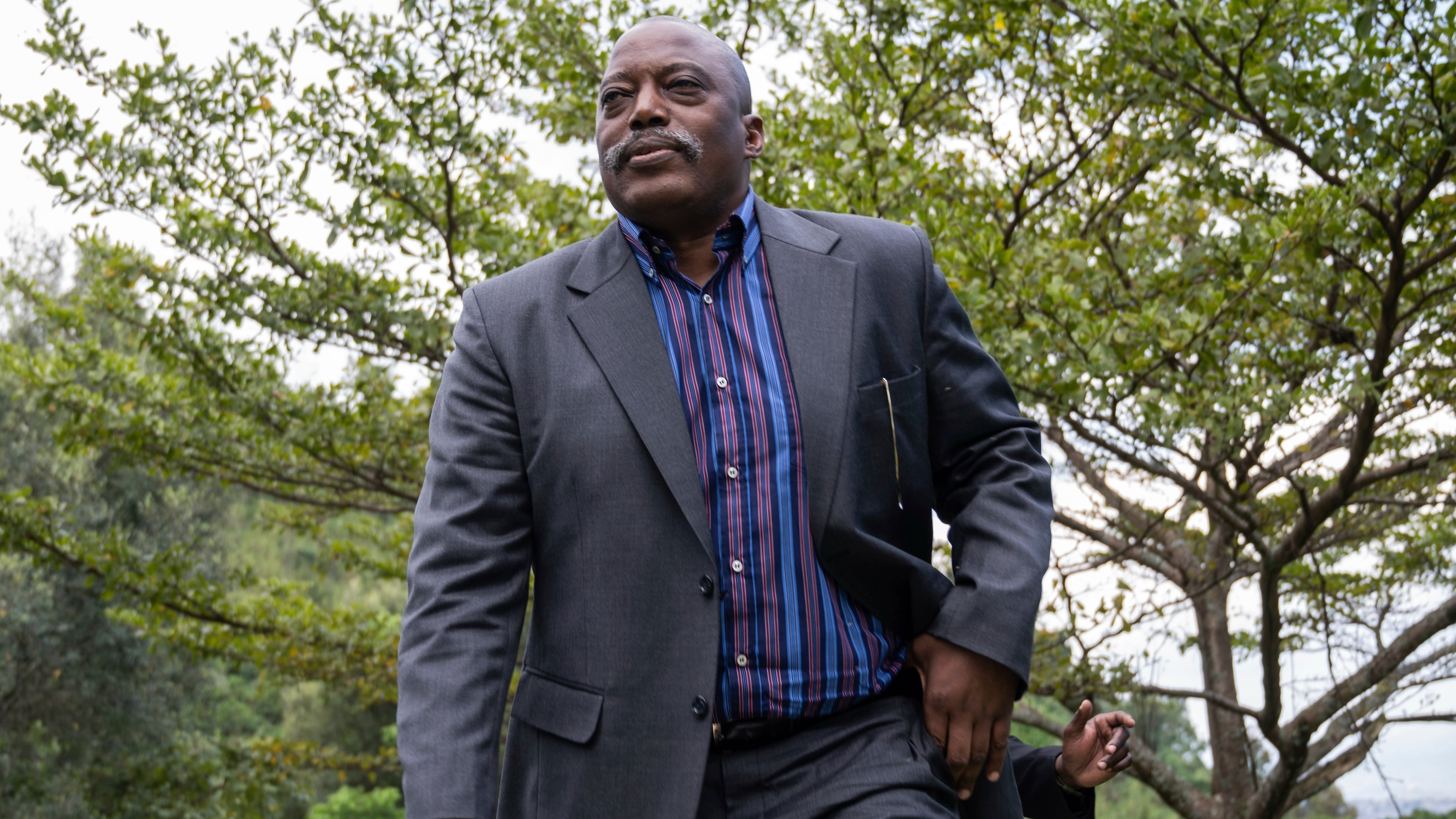 FILE - Former Democratic Republic of the Congo President Joseph Kabila arrives to meet with religious leaders at his Kinyogote residence in M23 controlled Goma, Eastern Congo, May 29, 2025. (AP Photo/Moses Sawasawa, File)