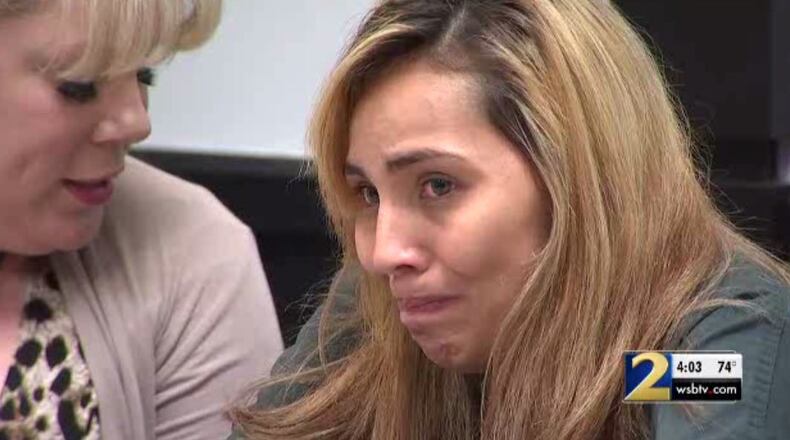 Evelin Vasquez, who is accused of falsely claiming to be a police officer to avoid paying for services at several Gwinnett County businesses, was denied bond during a court appearance Thursday.