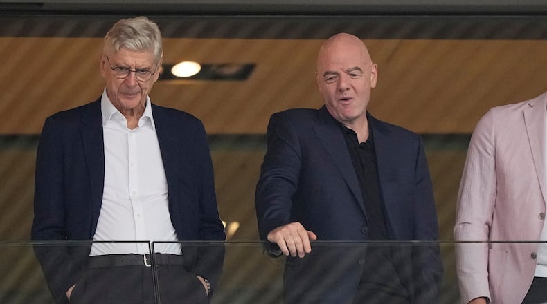 FILE - FIFA president Gianni Infantino, right, and Arsene Wenger, Chief Officer (FIFA) and former soccer coach arrive for the Women's Euro 2025 quarterfinals soccer match between Sweden and England at Stadion Letzigrund in Zurich, Switzerland, Thursday, July 17, 2025. (AP Photo/Martin Meissner, File)