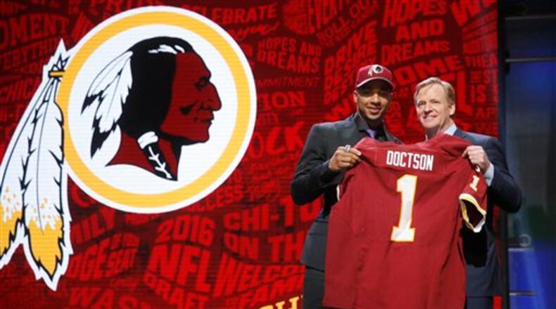 TCU�s Josh Doctson poses for photos with NFL commissioner Roger Goodell after being selected by Washington Redskins as the 22nd pick in the first round of the 2016 NFL football draft, Thursday, April 28, 2016, in Chicago. (AP Photo/Charles Rex Arbogast)