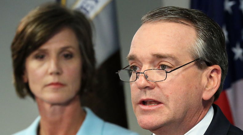 The FBI's Mark F. Giuliano (R) flanked by U.S. Attorney Sally Yates (L) speak during a press conference at the Richard B. Russell building in Atlanta on Thursday, May 16, 2013.