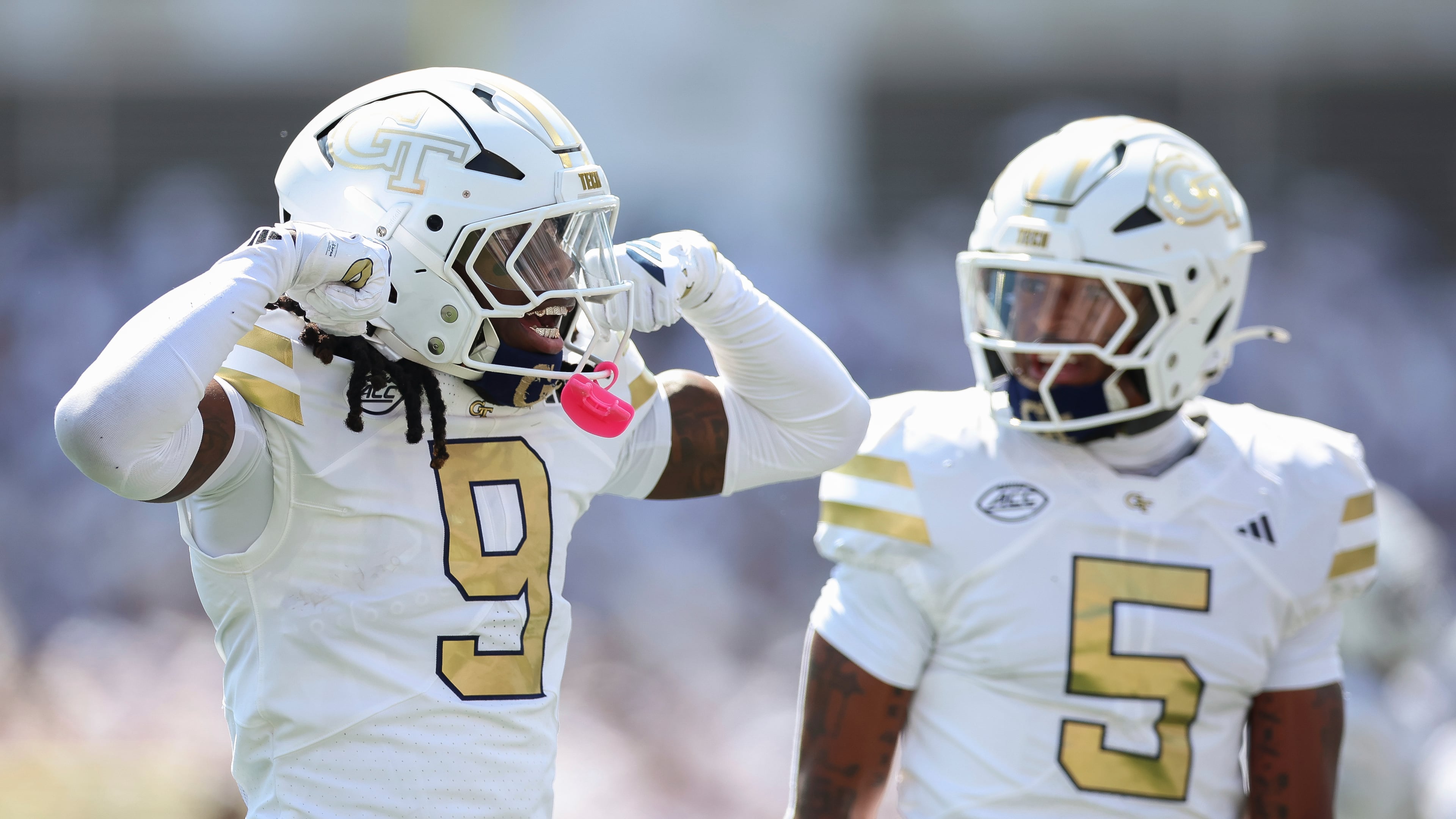 Georgia Tech defensive back Omar Daniels flexes his muscles during the first half of Saturday's against Clemson. (Colin Hubbard/AP)