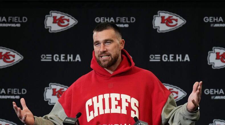 Kansas City Chiefs tight end Travis Kelce talks to reporters following an NFL football game against the Denver Broncos Thursday, Dec. 25, 2025, in Kansas City. (AP Photo/Charlie Riedel)