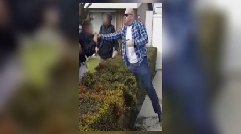An off-duty California police officer pulls gun at a group of teenagers. Image from WILX.