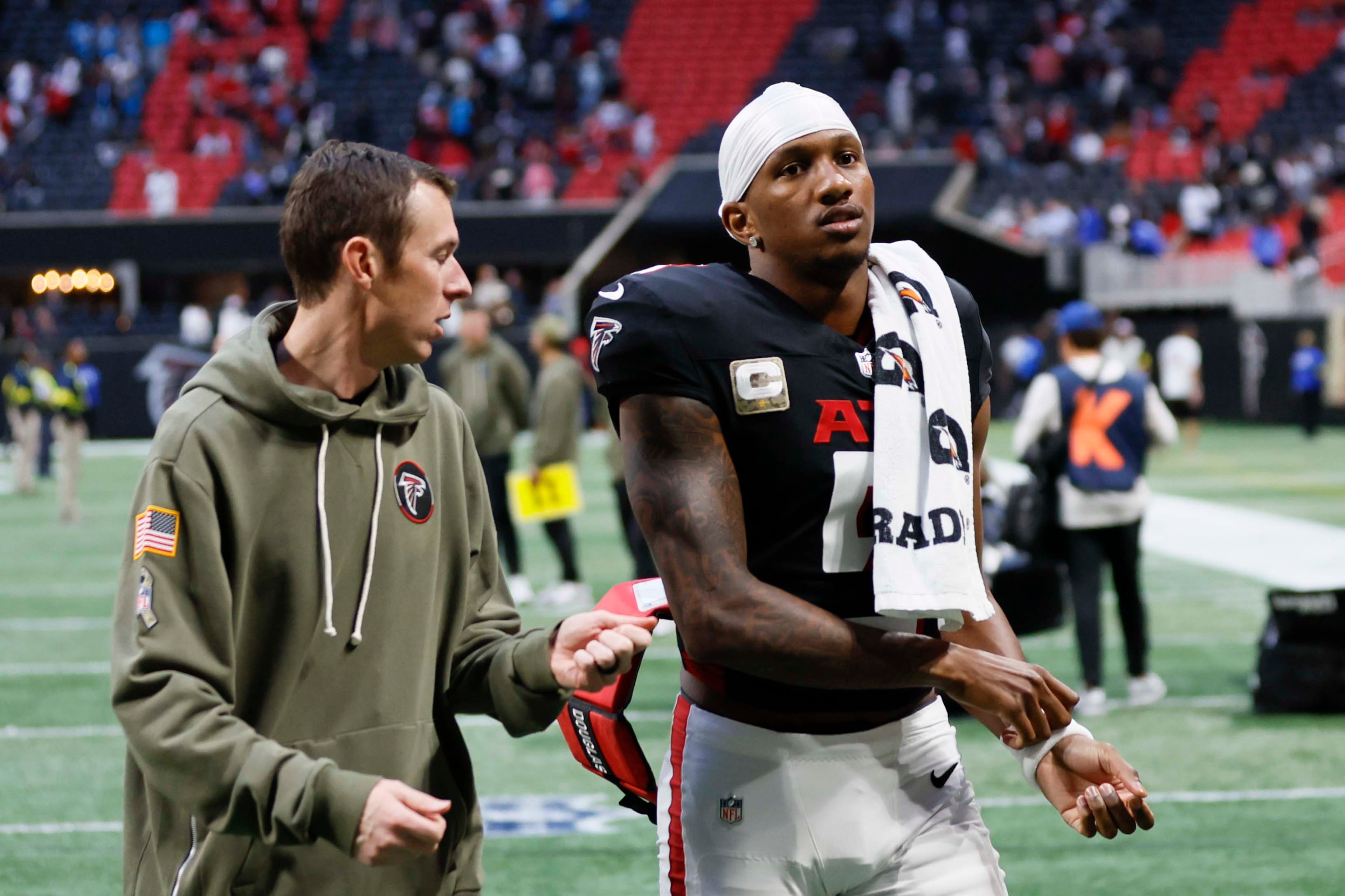 Atlanta Falcons quarterback Michael Penix Jr. leaves the field after the game. The Carolina Panthers defeated the Atlanta Falcons in overtime 30-27, at Mercedes-Benz Stadium in Atlanta on Sunday, Nov. 16, 2025. (Miguel Martinez/AJC)