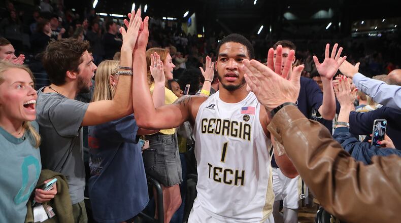November 28, 2017 Atlanta: Georgia Tech guard Tadric Jackson high fives fans after his game winning shot at the horn for a 52-51 victory over Northwestern in a NCAA college basketball game on Tuesday, November 28, 2017, in Atlanta.   Curtis Compton/ccompton@ajc.com