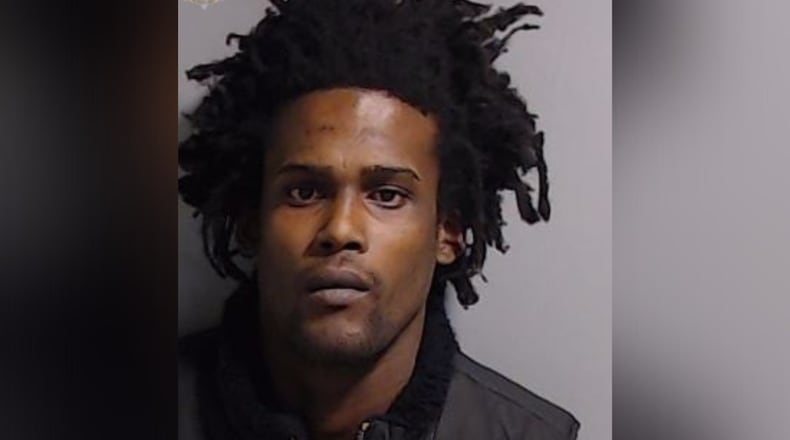 Alisteir Murray, 31, faces a charge of murder and aggravated assault in connection with a shooting that left a man dead and a woman injured, according to East Point police.