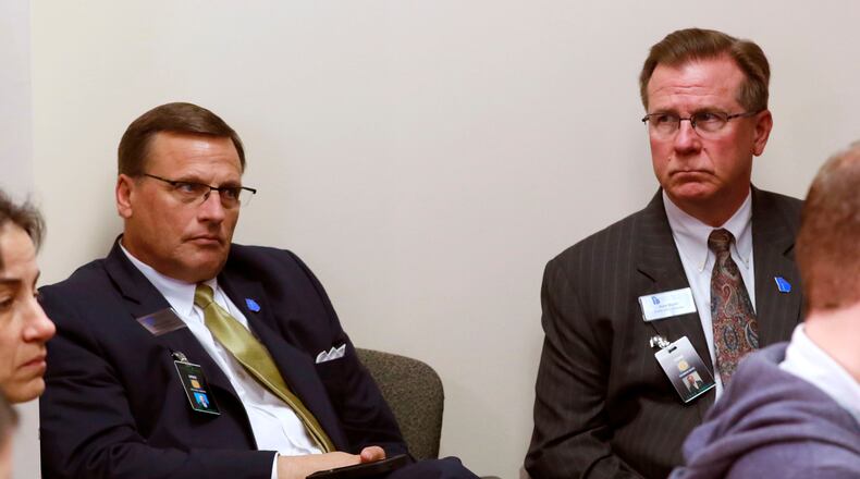 Mike Griffin (left) and Tom Rush from the Georgia Baptist Mission Board watch as state Sen. Greg Kirk, R – Americus, speaks at a press conference supporting House Bill 757, the “religious liberty” bill. Bob Andres, bandres@ajc.com