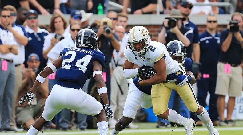 Ricky Jeune #2 of the Georgia Tech Yellow Jackets is tackled by Darius Jones Jr. #5 and Sean Freeman #24 of the Georgia Southern Eagles during the first half at Bobby Dodd Stadium on October 15, 2016 in Atlanta, Georgia. (Photo by Daniel Shirey/Getty Images)