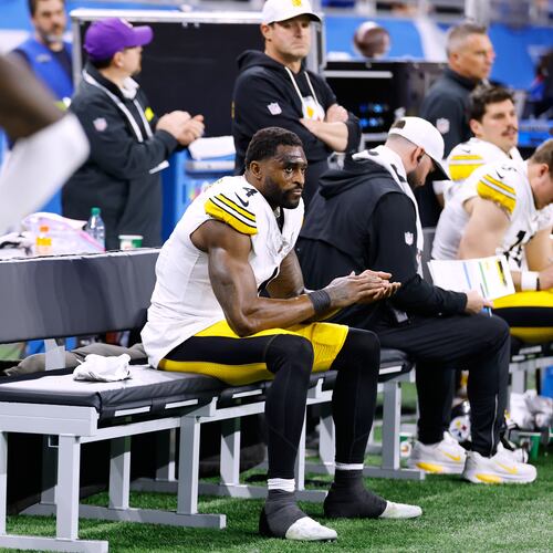 Pittsburgh Steelers' DK Metcalf sits on the bench during the second half of an NFL football game against the Detroit Lions, Sunday, Dec. 21, 2025, in Detroit. (AP Photo/Rey Del Rio)