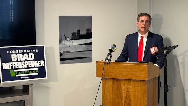 Secretary of State Brad Raffensperger details the "active threat" against him during a stop at Peachtree-DeKalb Airport on May 12, 2026. (Greg Bluestein/AJC)