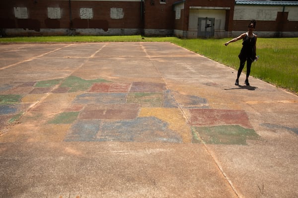 A painted map of the United States still remains in the former Lakewood Heights Elementary School's courtyard, even after the school was shuttered more than two decades ago. (Riley Bunch/AJC)