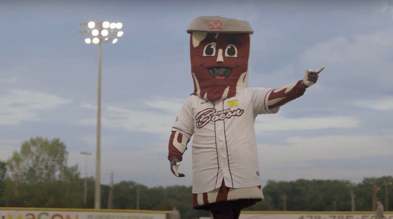 The Macon Bacon, a summer collegiate baseball team in Georgia, is sticking with its mascot despite pushback from a physicians group. MUST CREDIT: Harrison Tarr/Macon Bacon