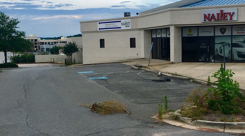 This is one of the old circa-1970s car dealerships just northeast of Decatur slated for demolition in the next two weeks. This will be the front end of the North Decatur Square develolpment (Church Street is just out of sight to the left) with this area featuring a one-acre park and Whole Foods grocery. The project, whose grading gradually declines from this spot on back, totals 11 acres. Bill Banks for the AJC