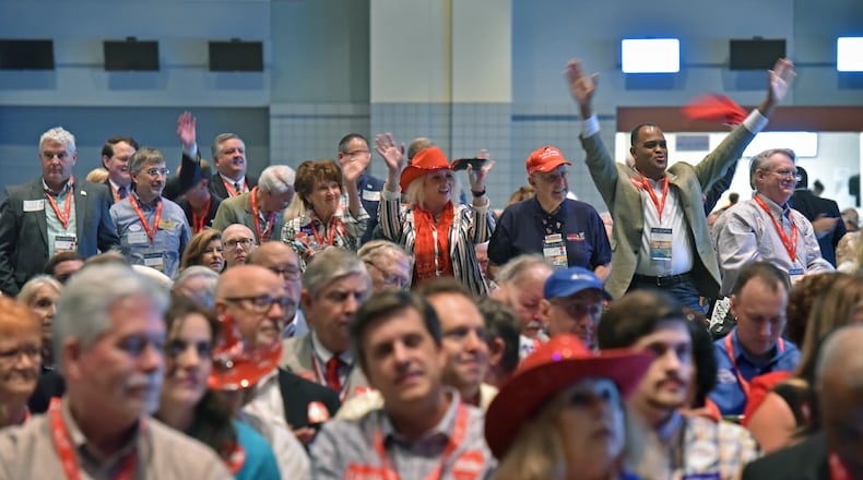 May 18, 2019 Savannah - Attendees react as Senator David Perdue is introduced during 2019 GAGOP State Convention at Savannah International Trade and Convention Center in Savannah on Saturday, May 18, 2019. More than 1,000 conservative activists gathered Saturday to plot the Georgia GOPâs strategy for next yearâs presidential election and select a new leader who will help steer the partyâs course. HYOSUB SHIN / HSHIN@AJC.COM