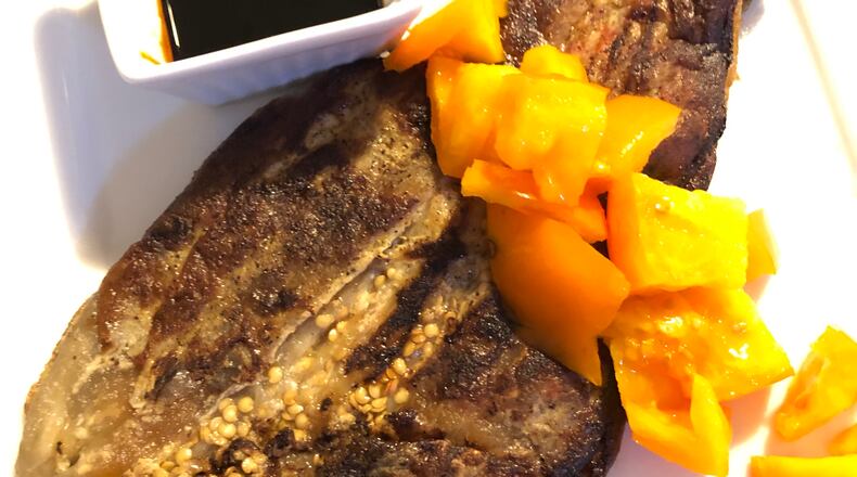 This version of Eggplant Omelet (Tortang Talong) is shown with diced yellow tomato.
C. W. Cameron for The Atlanta Journal-Constitution