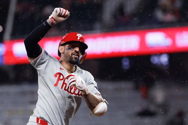 Philadelphia Phillies' Nick Castellanos reacts after hitting a home run during the second inning of a baseball game against the Atlanta Braves, Friday, June 27, 2025, in Atlanta. (AP Photo/Butch Dill)