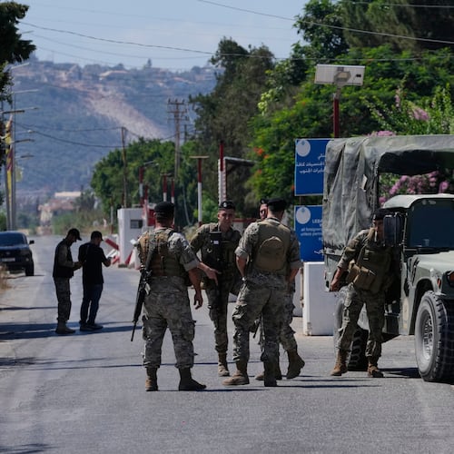 Lebanese army soldiers stand guard at a checkpoint near the border with Israel in the southern village of Mansouri, Lebanon, Friday, Sept. 4, 2026. (AP Photo/Mohammed Zaatari)