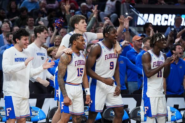 Florida players react on the bench during the second half in the Sweet 16 of the NCAA college basketball tournament against Maryland, Thursday, March 27, 2025, in San Francisco. (AP Photo/Marcio Jose Sanchez)