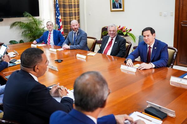 U.S. Secretary of State Marco Rubio, top right, meets with Jamaica's Prime Minister Andrew Holness and delegations at the office of the prime minister in Kingston, Jamaica, Wednesday, March 26, 2025. (Nathan Howard/Pool Photo via AP)