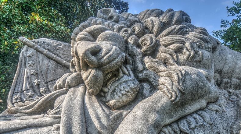 The Lion of Atlanta, or The Lion of the Confederacy by T. M. Brady commissioned in 1894 and carved from one of the largest pieces of Georgia marble quarried at the time, guards a field of unknown Confederate dead in Oakland Cemetery. The memorial statue was commissioned by the Atlanta Ladies Memorial Association and is part of the Oakland Cemetery Civil War Tour.