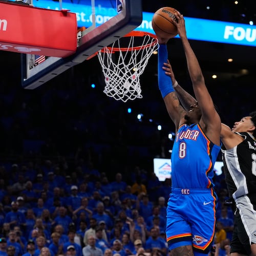 Oklahoma City Thunder guard Jalen Williams (8) shoots against San Antonio Spurs guard Dylan Harper (2) during overtime of Game 1 in a third-round NBA basketball playoffs series Monday, May 18, 2026, in Oklahoma City. (AP Photo/Tony Gutierrez)