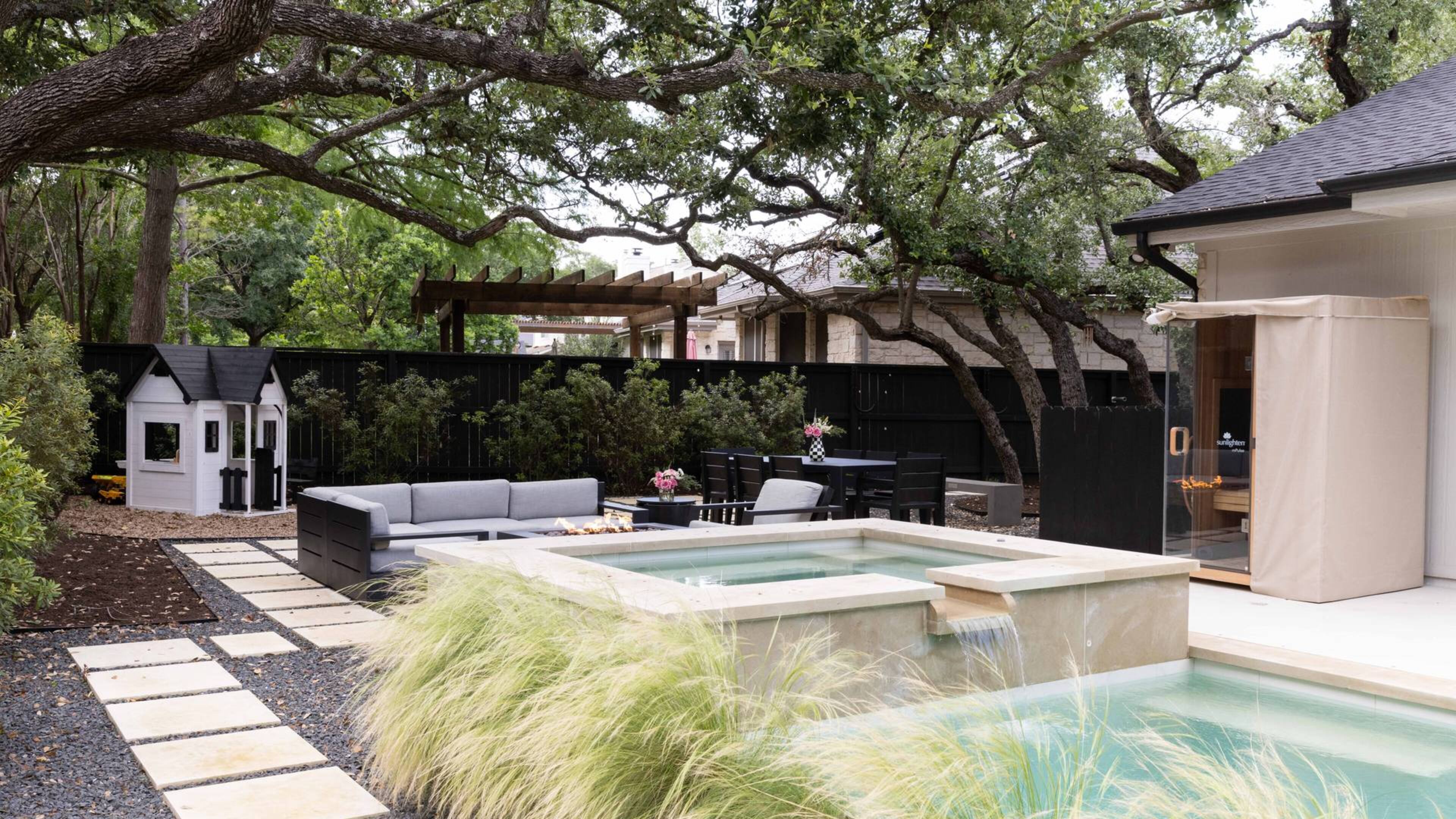 More homeowners are creating wellness areas in their backyards. This yard features a sauna, a narrow plunge pool and a hot tub, all in a relatively compact space. (Courtesy of Nicole Mlakar for Yardzen)