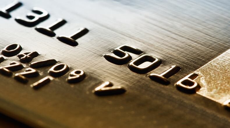 According to a new Primerica index, household finances are improving, but still under strain. Credit-card balances surpassed $1 trillion for the first time last quarter. (Dreamstime/TNS)