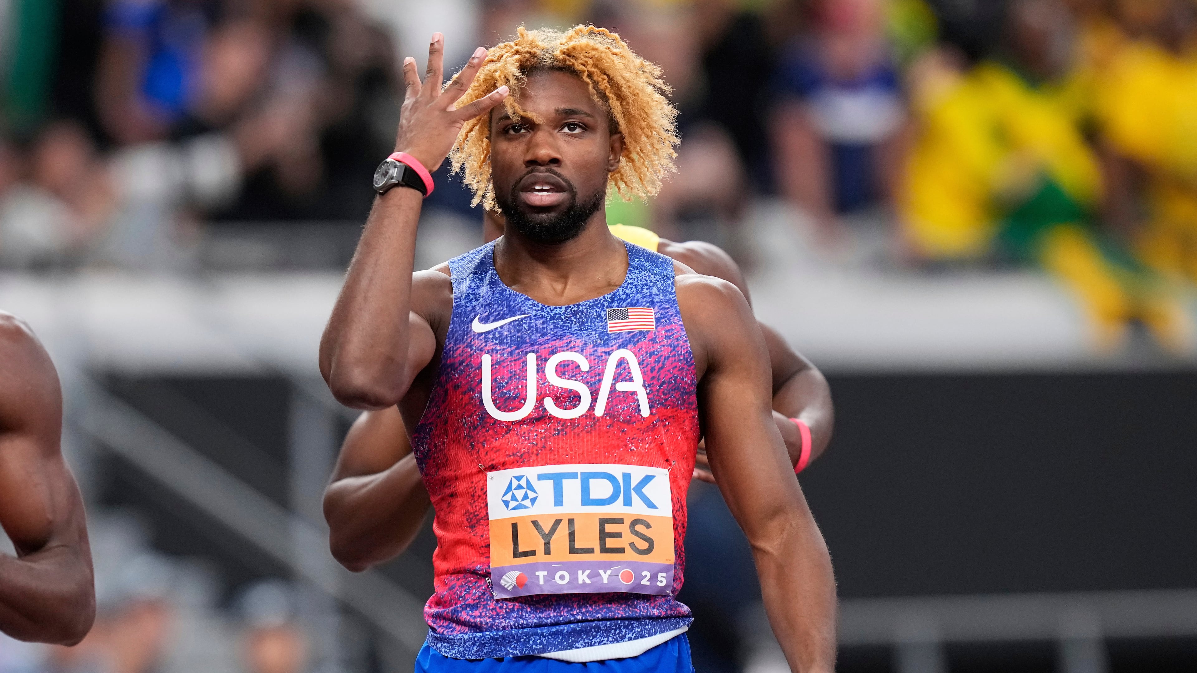 United States' Noah Lyles reacts after winning gold medal in the men's 200 meters final at the World Athletics Championships in Tokyo, Friday, Sept. 19, 2025. (AP Photo/Eugene Hoshiko)
