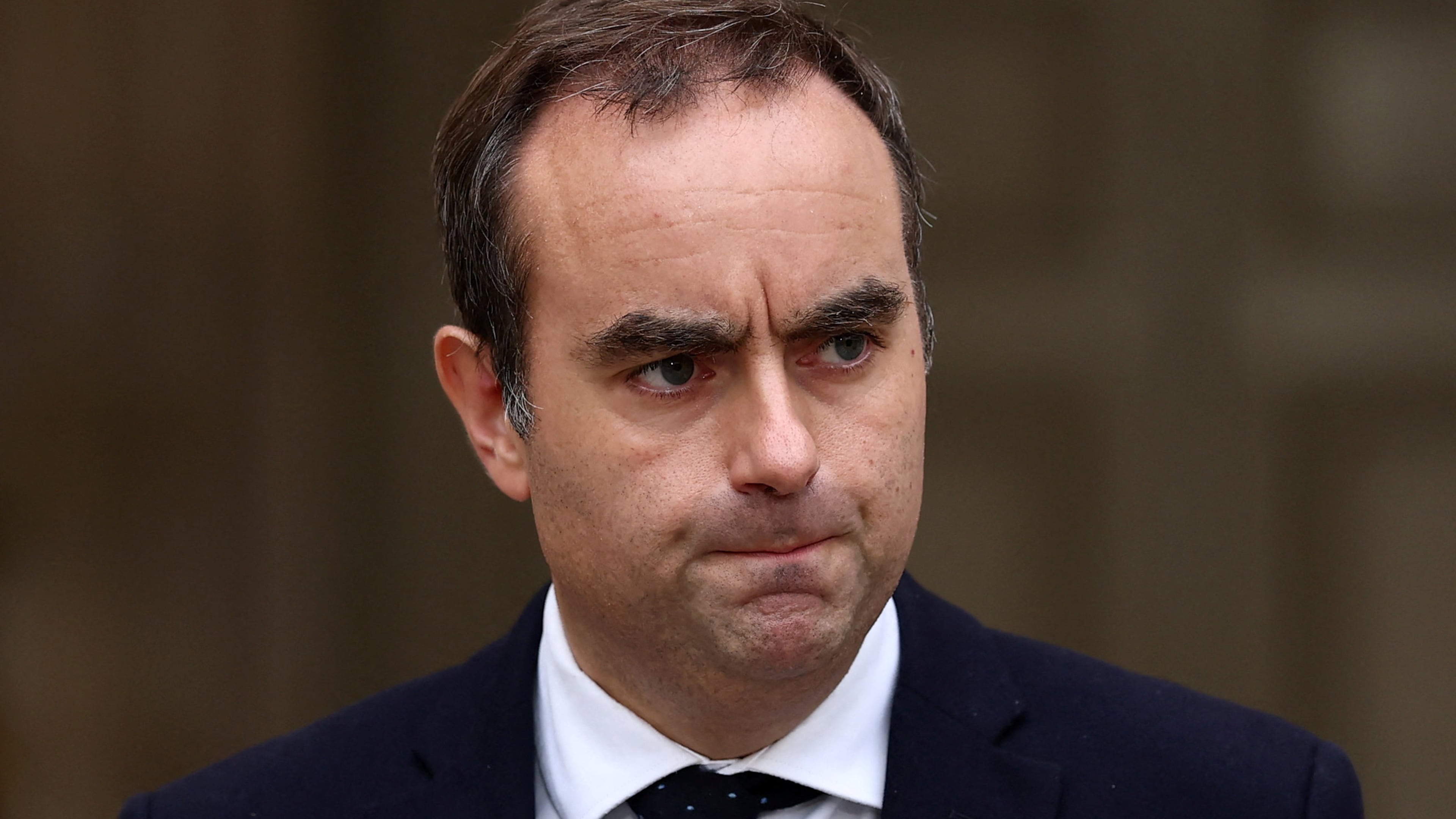 French outgoing Prime Minister Sebastien Lecornu, who resigned just a day after naming his government, arrives to deliver his statement at the Hotel Matignon in Paris, Monday, Oct. 6, 2025. (Stephane Mahe/Pool via AP)