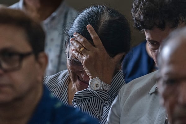 Mother of Clive Kunder, co-pilot of the Air India flight that crashed in Ahmedabad last month, mourns during a prayer meeting for the Air India crew, at a church in Mumbai, India, Saturday, July 12, 2025. (AP Photo/ Rafiq Maqbool)
