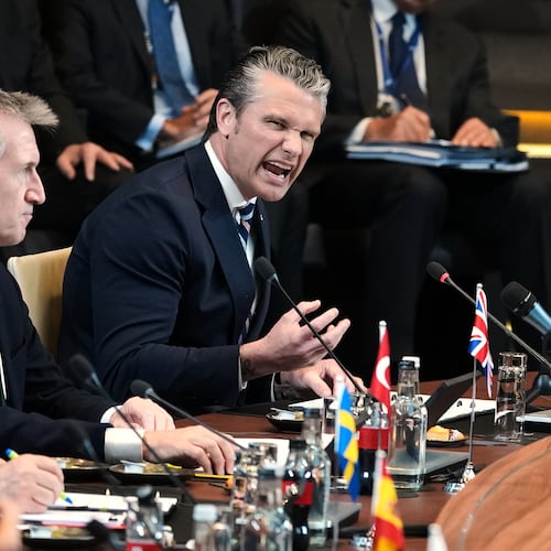 United States Defense Secretary Pete Hegseth, right, speaks during a meeting of the North Atlantic Council in defense ministers format at NATO headquarters in Brussels, Thursday, June 18, 2026. (AP Photo/Virginia Mayo)
